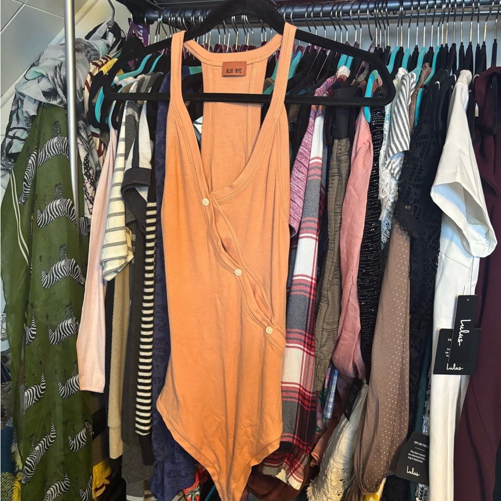ALIX NYC Sleeveless Orange Asymmetrical Bodysuit